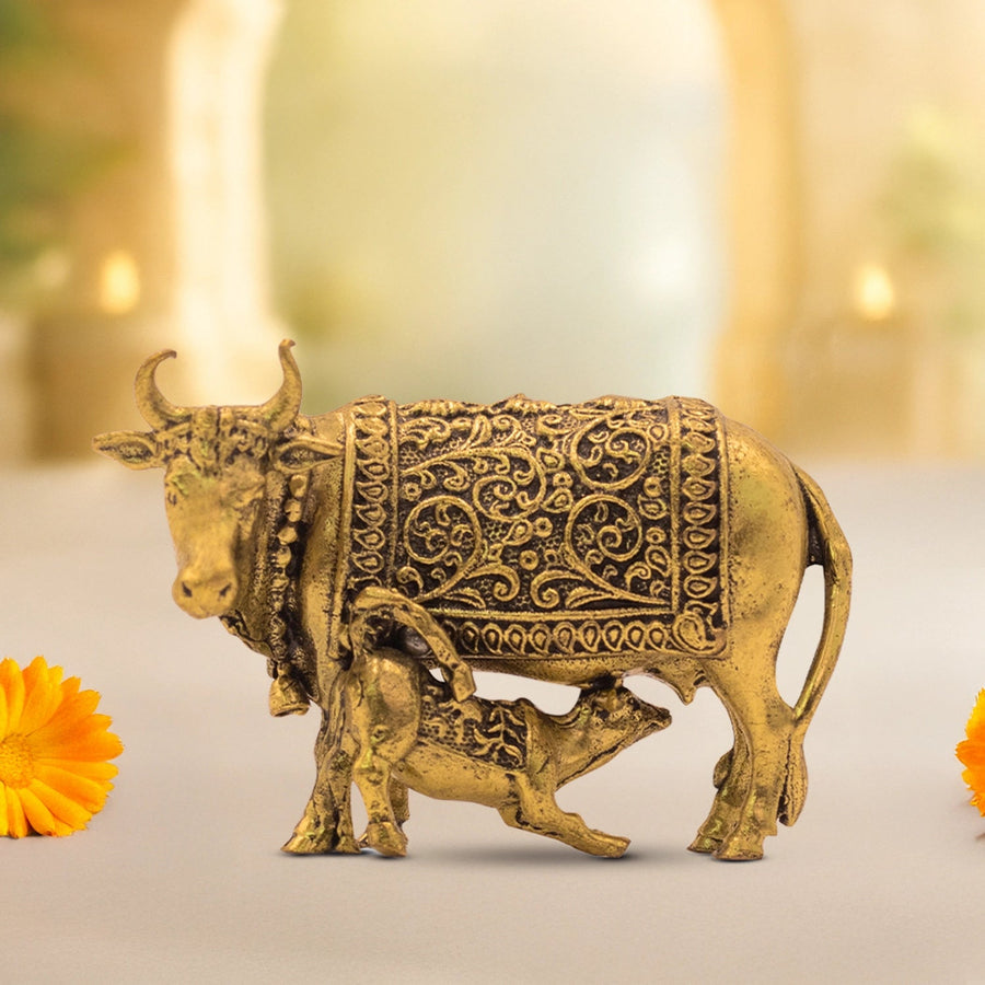 Handcrafted brass Kamdhenu cow idol, antique gold finish