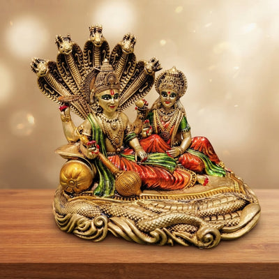 Brass Vishnu Lakshmi murti seated on Sheshnag serpent