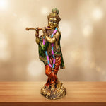 Brass Krishna murti playing flute, hand-painted detail
