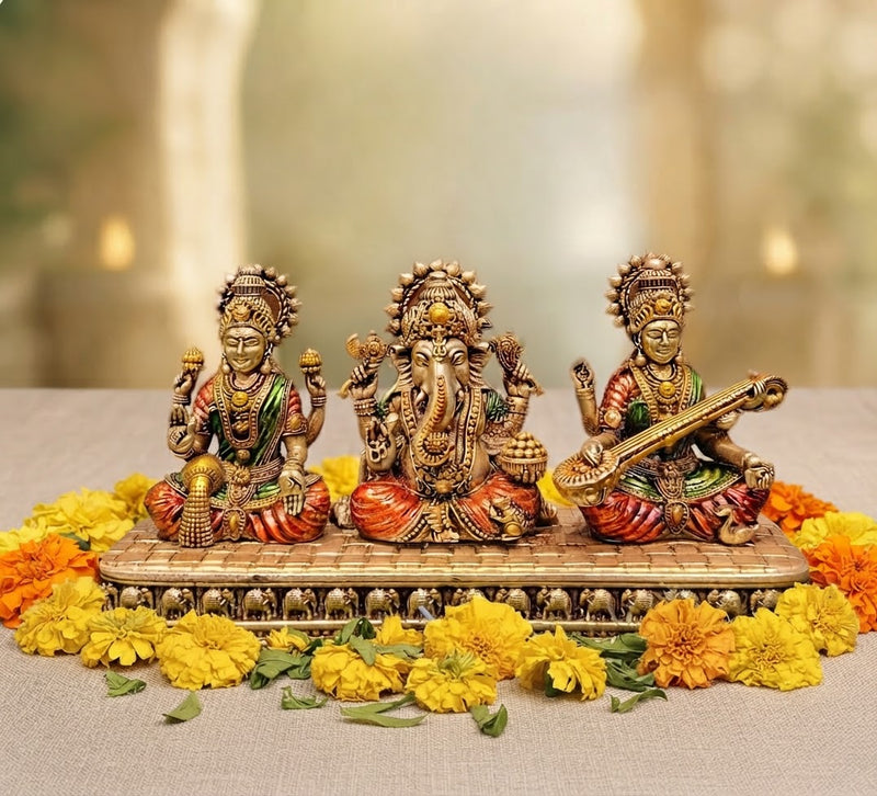 Brass Lakshmi Ganesha Saraswati idol set, front view